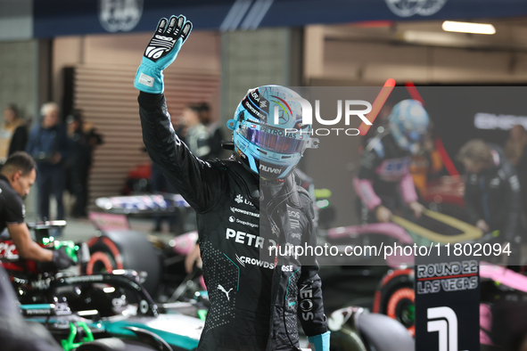 George Russell waves to the crowd after placing first (P1) in Qualifying during the Formula 1 Heineken Las Vegas Grand Prix in Las Vegas, Ne...