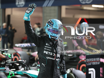 George Russell waves to the crowd after placing first (P1) in Qualifying during the Formula 1 Heineken Las Vegas Grand Prix in Las Vegas, Ne...