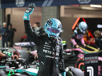 George Russell waves to the crowd after placing first (P1) in Qualifying during the Formula 1 Heineken Las Vegas Grand Prix in Las Vegas, Ne...