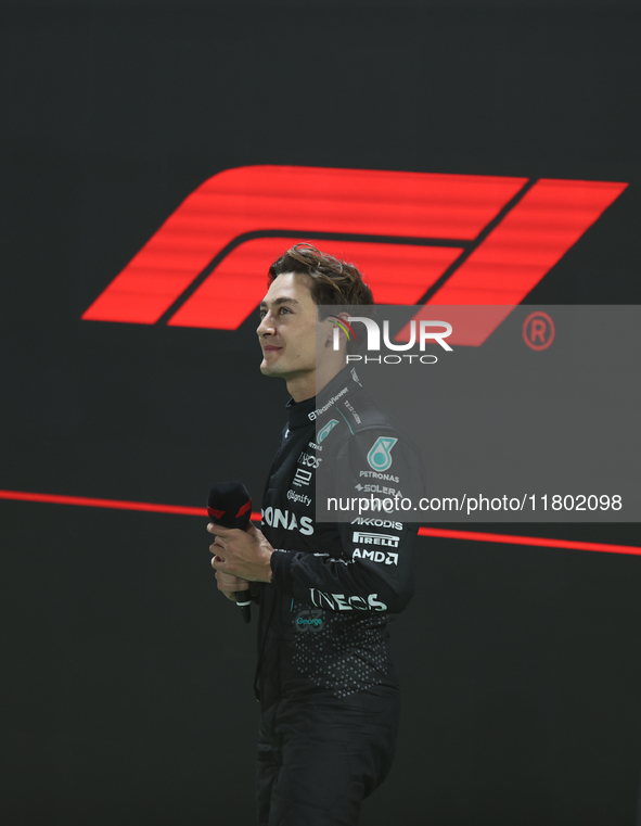 George Russell looks up at the crowd after placing first (P1) in Qualifying during the Formula 1 Heineken Las Vegas Grand Prix in Las Vegas,...