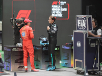 Carlos Sainz speaks to George Russell after qualifying during the Formula 1 Heineken Las Vegas Grand Prix in Las Vegas, Nevada, on November...