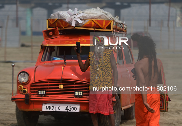 Indian Sadhus (Hindu holy men) gather during the Dharam Dhwaja (religious flag) ceremony at the Sangam area, ahead of the upcoming Maha Kumb...