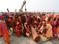 Indian Sadhus (Hindu holy men) gather during the Dharam Dhwaja (religious flag) ceremony at the Sangam area, ahead of the upcoming Maha Kumb...