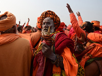 Indian Sadhus (Hindu holy men) gather during the Dharam Dhwaja (religious flag) ceremony at the Sangam area, ahead of the upcoming Maha Kumb...