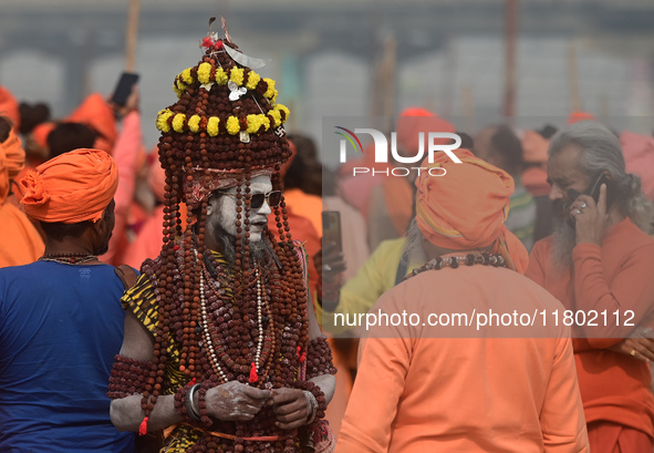 Indian Sadhus (Hindu holy men) gather during the Dharam Dhwaja (religious flag) ceremony at the Sangam area, ahead of the upcoming Maha Kumb...