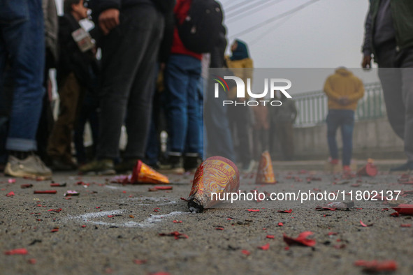 Waste from firecrackers is pictured as Bharatiya Janata Party (BJP) supporters celebrate after winning a majority in the Maharashtra state a...