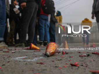 Waste from firecrackers is pictured as Bharatiya Janata Party (BJP) supporters celebrate after winning a majority in the Maharashtra state a...