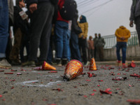 Waste from firecrackers is pictured as Bharatiya Janata Party (BJP) supporters celebrate after winning a majority in the Maharashtra state a...