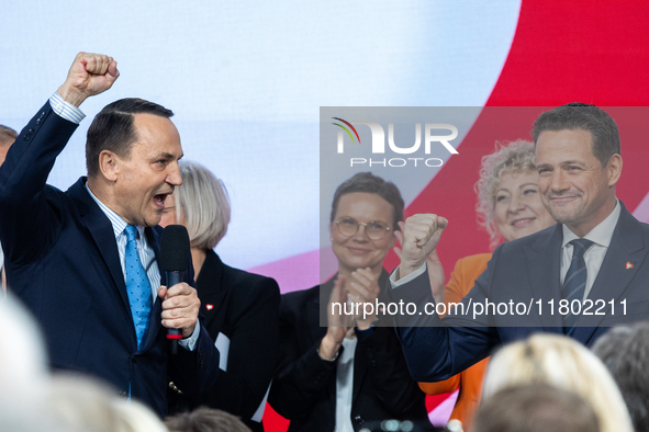 Polish Foreign Minister Radoslaw Sikorski (L) with Mayor Rafal Trzaskowski (R), after losing in the Civic Platform primary, where Trzaskowsk...