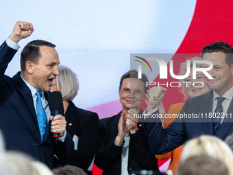 Polish Foreign Minister Radoslaw Sikorski (L) with Mayor Rafal Trzaskowski (R), after losing in the Civic Platform primary, where Trzaskowsk...