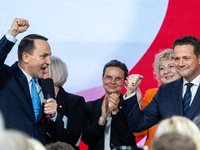 Polish Foreign Minister Radoslaw Sikorski (L) with Mayor Rafal Trzaskowski (R), after losing in the Civic Platform primary, where Trzaskowsk...