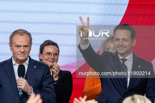 Polish PM Donald Tusk and Mayor Rafal Trzaskowski (R) celebrate after Trzaskowski win in the Civic Platform primary with over 75% votes and...