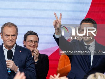 Polish PM Donald Tusk and Mayor Rafal Trzaskowski (R) celebrate after Trzaskowski win in the Civic Platform primary with over 75% votes and...