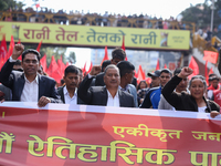 Netra Bikram Chand (Center), the leader and chairman of the Nepal Communist Party, takes part in a march organized in Kathmandu, Nepal, on N...