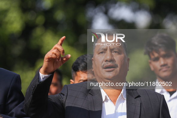 Netra Bikram Chand (Center), the leader and chairman of the Nepal Communist Party, takes part in a march organized in Kathmandu, Nepal, on N...