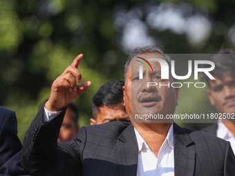 Netra Bikram Chand (Center), the leader and chairman of the Nepal Communist Party, takes part in a march organized in Kathmandu, Nepal, on N...