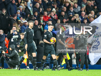 Referee Lewis Smith (with ball) leads the teams out during the Sky Bet Championship match between West Bromwich Albion and Norwich City at T...