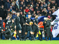 Referee Lewis Smith (with ball) leads the teams out during the Sky Bet Championship match between West Bromwich Albion and Norwich City at T...