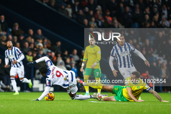 Josh Maja of WBA is brought down by Shane Duffy of Norwich City during the Sky Bet Championship match between West Bromwich Albion and Norwi...