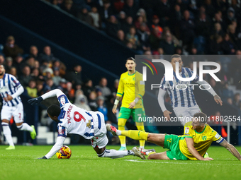 Josh Maja of WBA is brought down by Shane Duffy of Norwich City during the Sky Bet Championship match between West Bromwich Albion and Norwi...