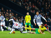 Josh Maja of WBA is brought down by Shane Duffy of Norwich City during the Sky Bet Championship match between West Bromwich Albion and Norwi...