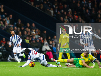 Josh Maja of WBA is brought down by Shane Duffy of Norwich City during the Sky Bet Championship match between West Bromwich Albion and Norwi...