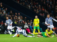 Josh Maja of WBA is brought down by Shane Duffy of Norwich City during the Sky Bet Championship match between West Bromwich Albion and Norwi...