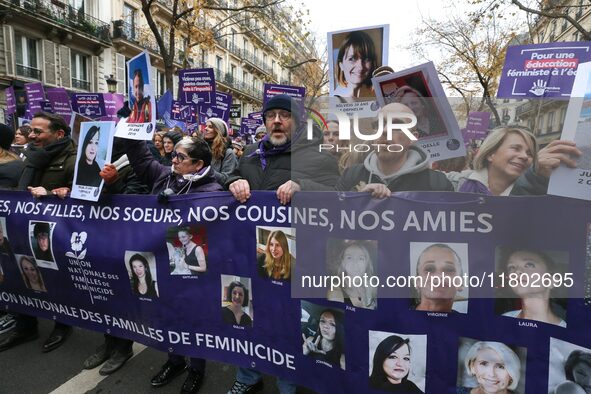 Demonstrators hold a banner as they participate in a protest to condemn violence against women, organized by feminist organizations two days...