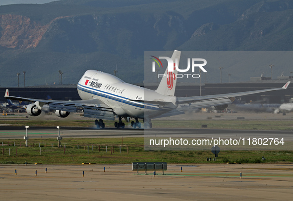 A Boeing 747-4J6 of the Air China company lands in Barcelona, Spain, on November 23, 2024, carrying Zhao Leji, President of the National Ass...