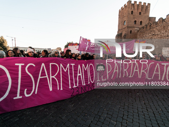 Women participate in a demonstration prior to the 'International Day for the Elimination of Violence against Women' in Rome, Italy, on Novem...