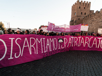 Women participate in a demonstration prior to the 'International Day for the Elimination of Violence against Women' in Rome, Italy, on Novem...