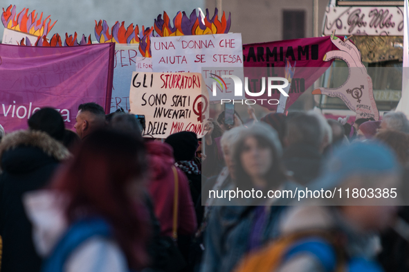 Women participate in a demonstration prior to the 'International Day for the Elimination of Violence against Women' in Rome, Italy, on Novem...