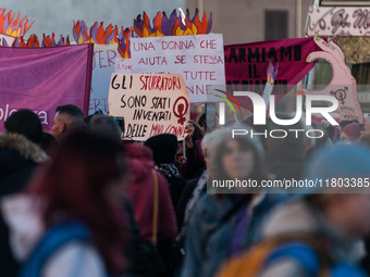 Women participate in a demonstration prior to the 'International Day for the Elimination of Violence against Women' in Rome, Italy, on Novem...