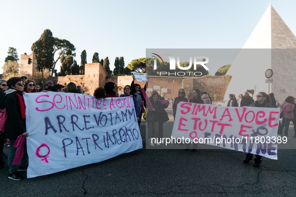 Women participate in a demonstration prior to the 'International Day for the Elimination of Violence against Women' in Rome, Italy, on Novem...