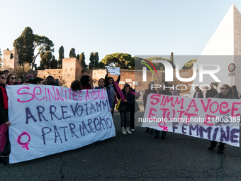 Women participate in a demonstration prior to the 'International Day for the Elimination of Violence against Women' in Rome, Italy, on Novem...