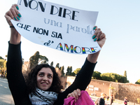 Women participate in a demonstration prior to the 'International Day for the Elimination of Violence against Women' in Rome, Italy, on Novem...