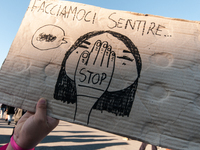 Women participate in a demonstration prior to the 'International Day for the Elimination of Violence against Women' in Rome, Italy, on Novem...