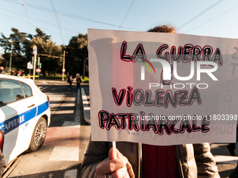 Women participate in a demonstration prior to the 'International Day for the Elimination of Violence against Women' in Rome, Italy, on Novem...