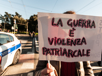 Women participate in a demonstration prior to the 'International Day for the Elimination of Violence against Women' in Rome, Italy, on Novem...