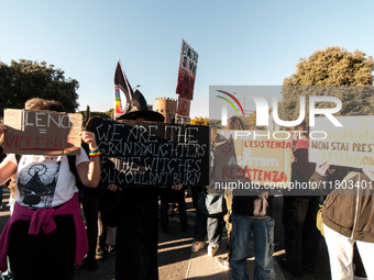 Women participate in a demonstration prior to the 'International Day for the Elimination of Violence against Women' in Rome, Italy, on Novem...