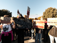 Women participate in a demonstration prior to the 'International Day for the Elimination of Violence against Women' in Rome, Italy, on Novem...