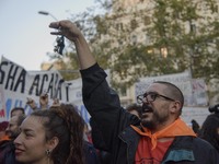 A massive demonstration takes place through the streets of Barcelona, Spain, on November 23, 2024, to protest against rising rents and for t...