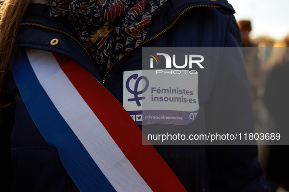 A deputy wears a sticker reading 'Feminist unbowed'. Women from the collective NousToutes and other organizations such as SUD or Amnesty Int...