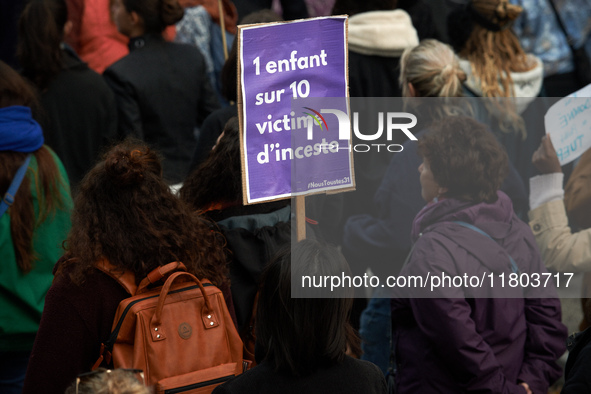 The placard reads 'One child in ten is a victim of incest'. Women from the collective NousToutes and other organizations such as SUD or Amne...