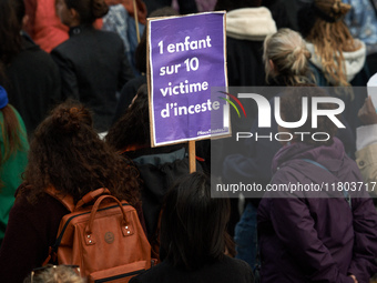 The placard reads 'One child in ten is a victim of incest'. Women from the collective NousToutes and other organizations such as SUD or Amne...