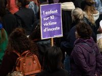 The placard reads 'One child in ten is a victim of incest'. Women from the collective NousToutes and other organizations such as SUD or Amne...