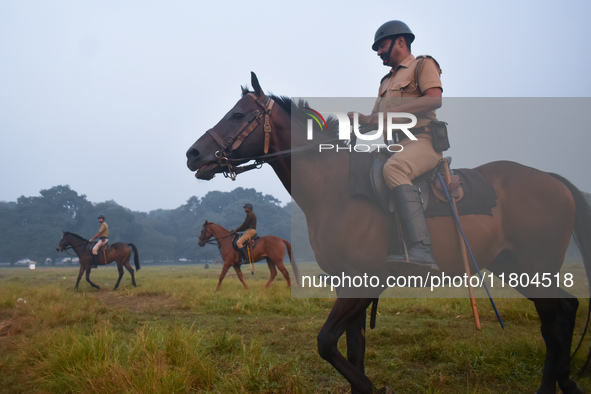 Kolkata Mounted police officers patrol inside a ground in Kolkata, India, on November 24, 2024. 