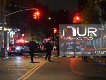 A person is shot in the Alphabet City neighborhood of Manhattan's East Village in New York, United States, on November 24, 2024. On Sunday m...