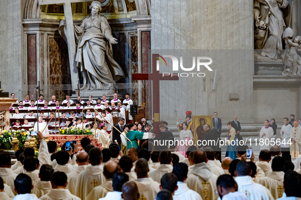 Youths hand over the cross of the World Youth Day to organizers of the next edition that will be held in Seoul, South Korea, in 2027, during...