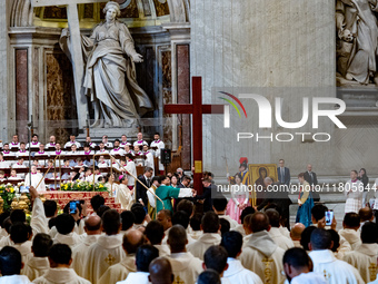 Youths hand over the cross of the World Youth Day to organizers of the next edition that will be held in Seoul, South Korea, in 2027, during...